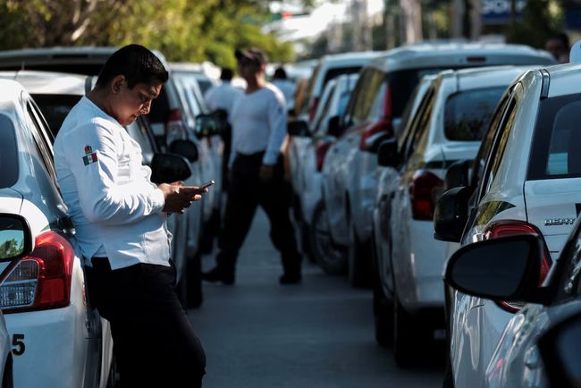 Taxis are waiting to take a new transfer service