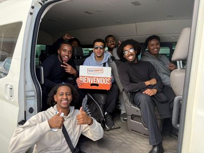 Happy travelers arriving at their Cancun destination